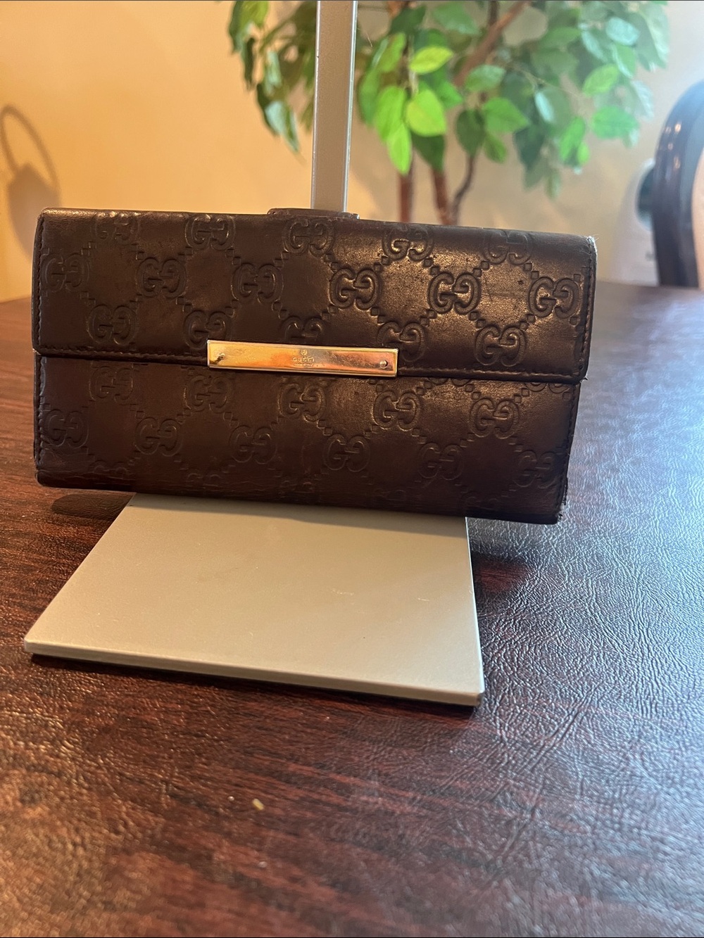 Gucci Brown Embossed GG Leather Clutch with Gold Bar